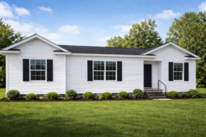 Single story white ranch modular home exterior with black shutters in Western New York