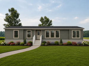 Manorwood Limited ranch style manufactured home exterior with covered front porch and landscaped lawn, available from Owl Homes of Fredonia
